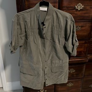 Chico’s… Unusual, detailed, light weight jacket/cover.